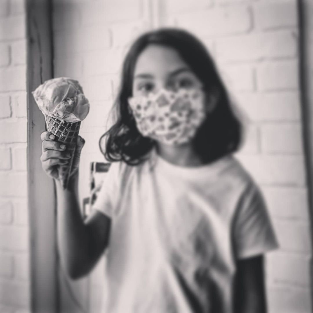 Little girl holding ice ice cream